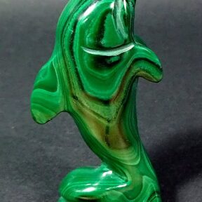 carving of a Dolphin made from Malachite