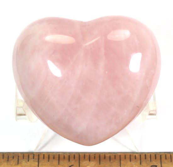 This is a beautiful gemstone Heart carved from Rose Quartz. The pretty Pink heart has very nice inclusions that add tons of character. It measures almost 1 3/4" wide x 1 1/2" tall x over 7/8" thick and has a nice polish. Very Nice!