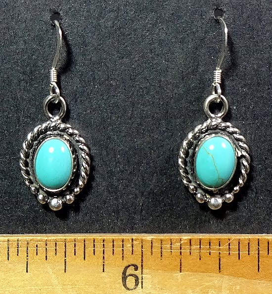 Turquoise cabochons mounted in a Sterling Silver setting