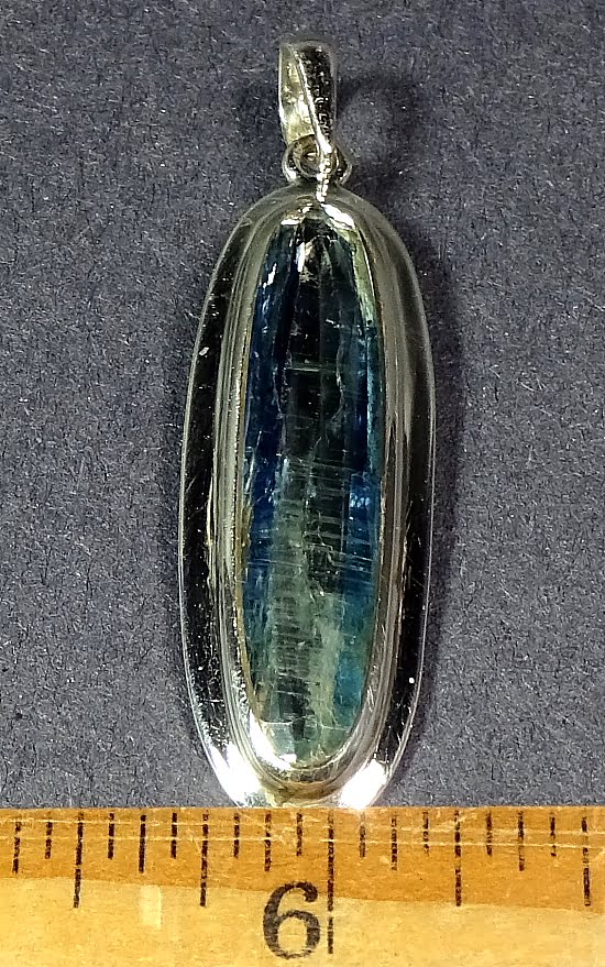 Kyanite pendant resting in a very nice sterling Silver setting