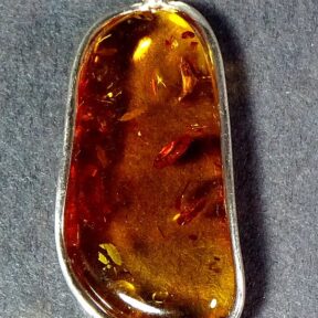 sterling Silver pendant with a beautiful golden Amber cabochon
