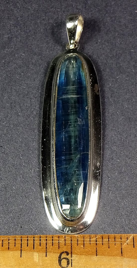 Kyanite pendant resting in a very nice sterling Silver setting