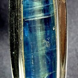 Kyanite pendant resting in a very nice sterling Silver setting