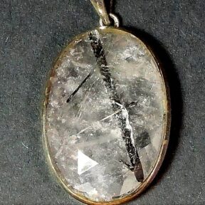 sterling Silver pendant with a 21mm x 31mm faceted Tourmalated Quartz cabochon