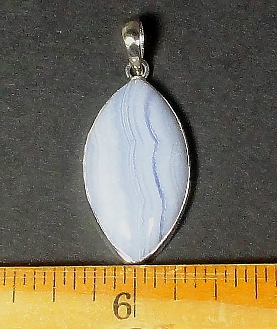 sterling Silver pendant with a faceted Blue Lace Agate cabochon