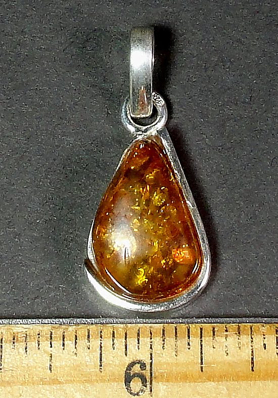 sterling Silver pendant with an 11mm x 20mm Amber stone