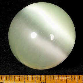 White Fiber Optic sphere measuring 40 mm in diameter and highly polished.