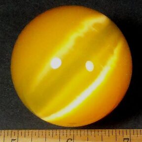Orange Fiber Optic sphere measuring 50 mm in diameter and highly polished.