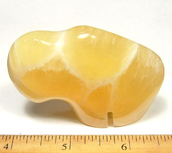 Buffalo fetish is carved from Orange Calcite from Utah