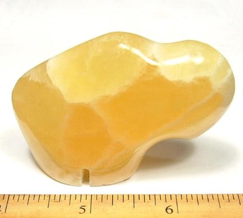 Buffalo fetish is carved from Orange Calcite from Utah