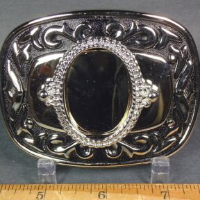 Silver plated belt buckle with black inlay on rim