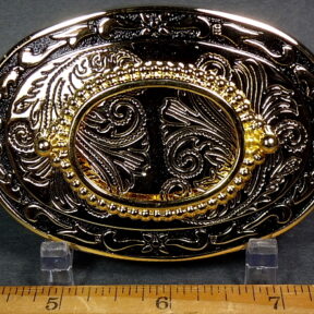 Gold plated belt buckle with a high shine and some black inlay